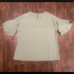mint green blouse